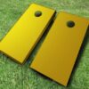 gold painted cornhole set