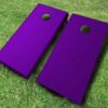 purple painted cornhole set